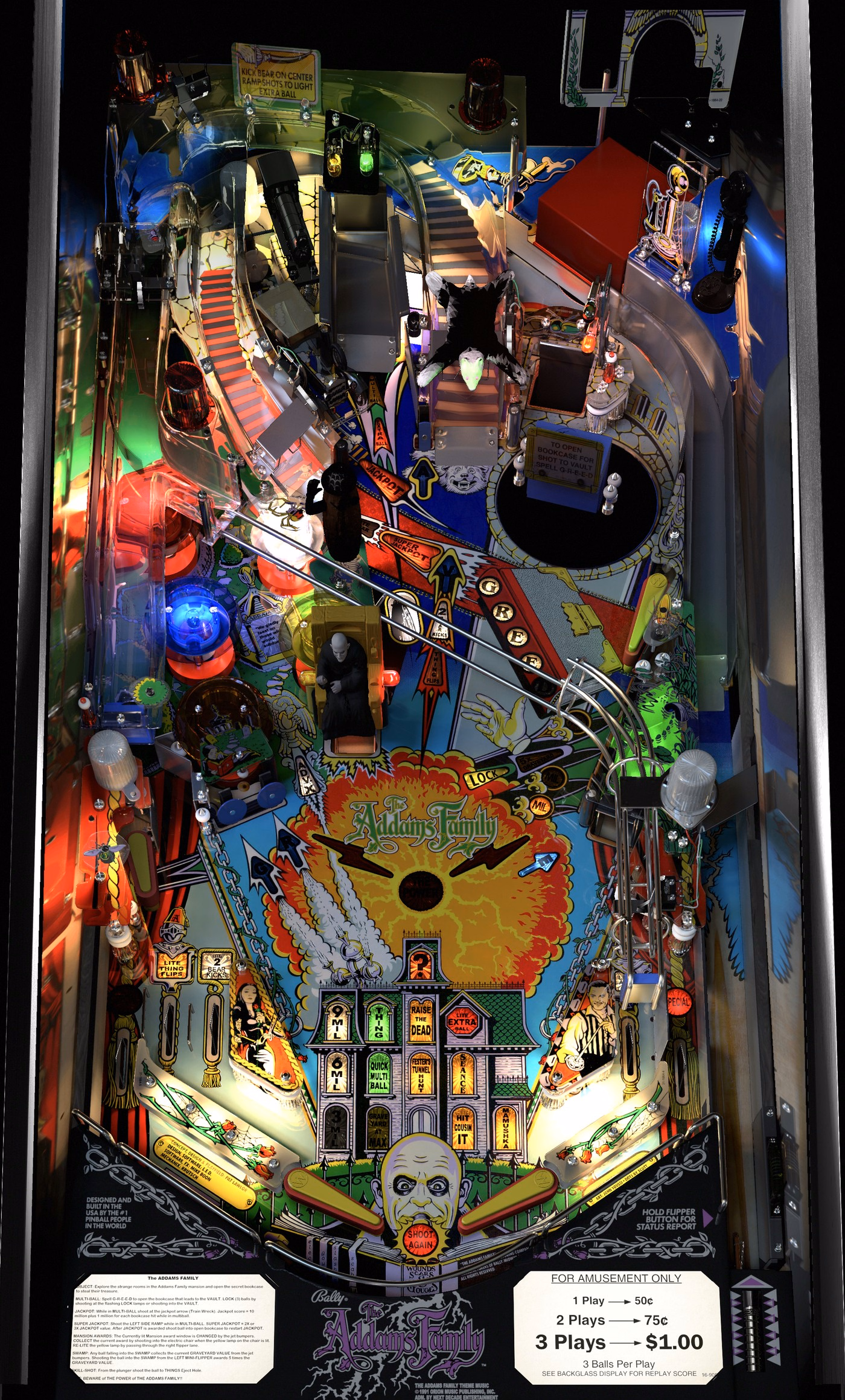 Installed The Addams Family playfield with real feature close-ups alongside