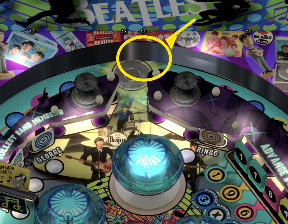Upper-center magnet area marked with a yellow circle and arrow
