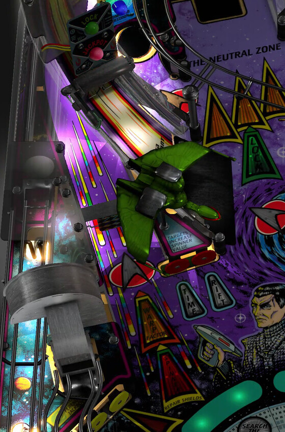 Left orbit and spinner on the installed playfield