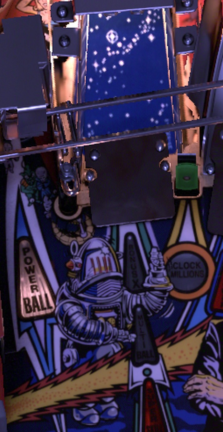 The clear plastic Left Ramp in the centre of the installed Twilight Zone playfield, with its swinging gate and three lamps in front