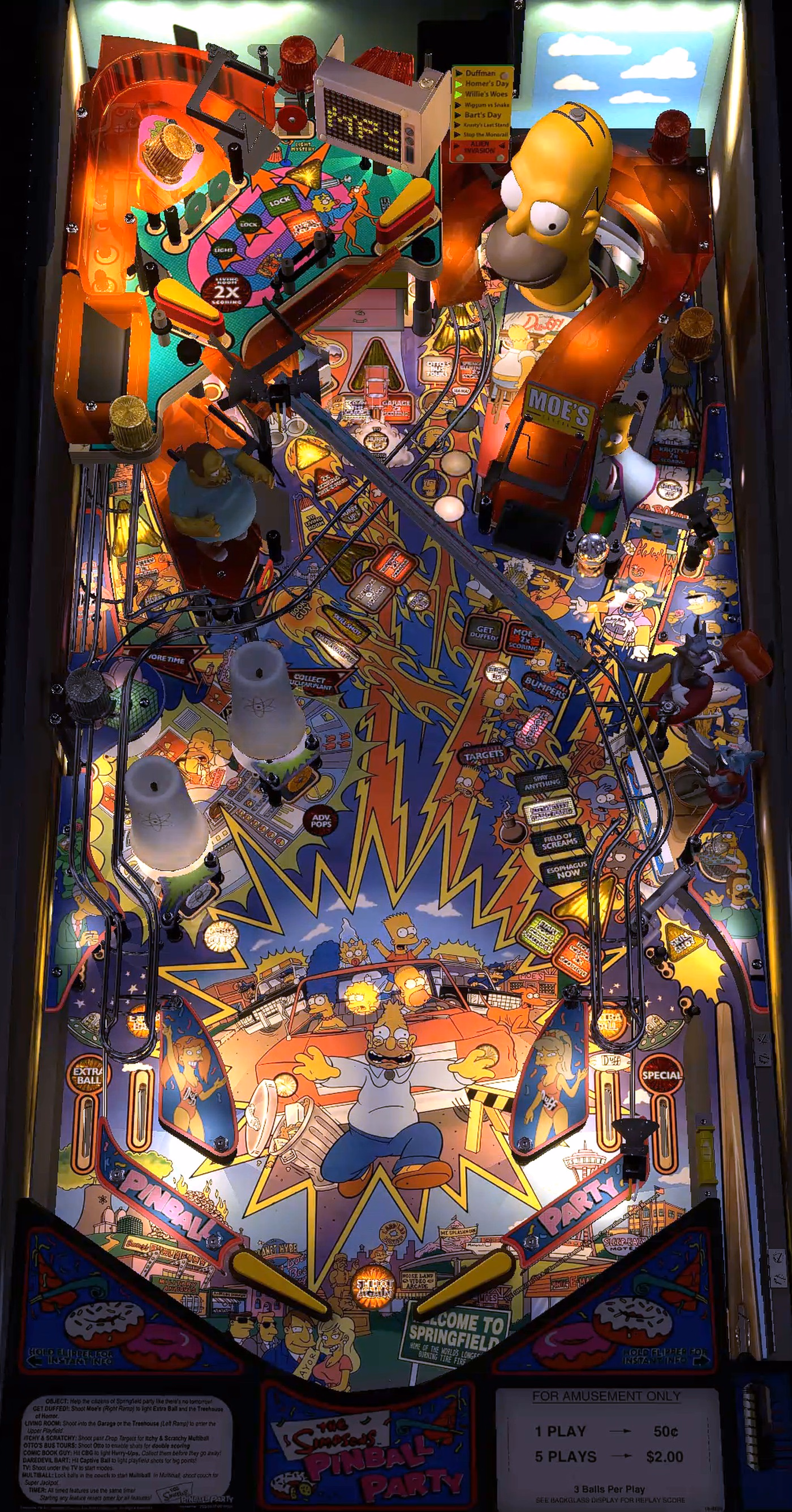 Full physical Simpsons Pinball Party playfield showing the lower field, ramps, garage, Homer head and upper playfield
